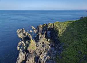 Rocky coast and rock gate on the south-east coast near the southern tip of Cornwall on the English