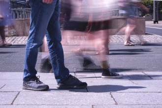 Passers-by in a summer city, shopping, Germany