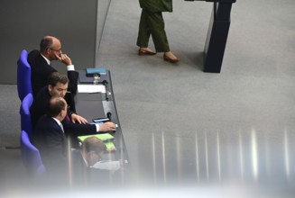 Federal Chancellor Friedrich Merz (CDU) and parts of his cabinet sit on the government bench,