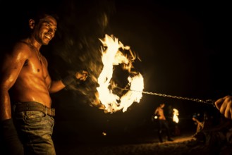 Fire show, jugglers with fire, Ao Nang Beach, sunset, Ao Nang, Krabi, Thailand