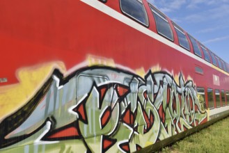Double-decker carriage, double-decker train, double-decker carriage with graffiti