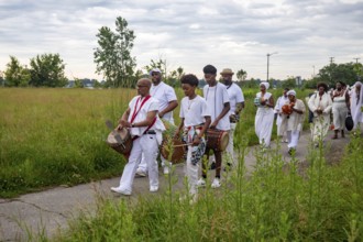 Detroit, Michigan - African-Americans gather on the banks of the Detroit River to commemorate