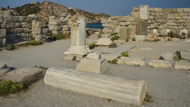 Ancient marble ruins with remains of columns and walls in an archaeological site, Agios Stefanos