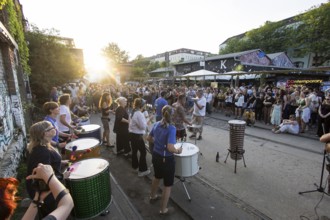 The band Berlin Percussion plays on the RAW grounds as part of the Fête de la Musique. The music