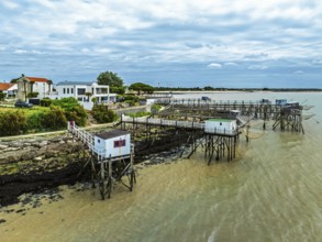 Fishing huts over Randonnee entre Histoire et Nature from a drone, Fouras, Fouras-les-Bains,