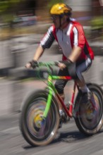 Man riding a bicycle, Photo with motion blur, City of Quito, Pichincha province, Ecuador, South