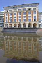 Melanchthonhaus with arcade built in 1914, reflection, Enz, river bank, Pforzheim, Northern Black