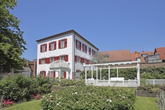 Rose garden and historic Klösterle house, park with flowers, Ettlingen, Black Forest, Northern