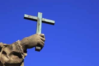 Detail of hand with cross, St John of Nepomuk on the Old Main Bridge, Würzburg, Lower Franconia,