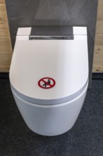 Symbol photo toilet seating ban