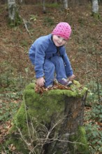 Girl playing in the forest, child in nature, love of nature, Allgäu, Bavaria, Germany, Allgäu,