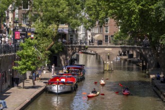 The old town centre of Utrecht, Oudegracht, around 2 km long with many old houses, shops,