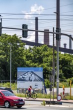 Construction site sign for thyssenkrupp Steel's first direct reduction plant, the climate-neutral
