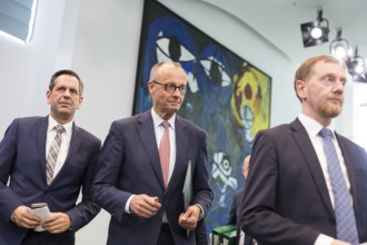 Olaf Lies (SPD, Minister President of Lower Saxony), Friedrich Merz (CDU, Federal Chancellor) and