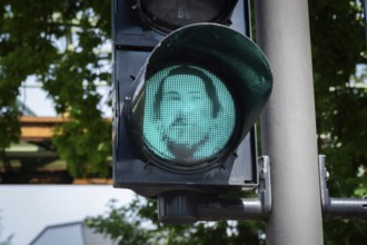 Portrait of Friedrich Engels on a pedestrian traffic light in Wuppertal, Germany
