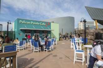 Visitors eating at the Pelican Pointe Cafe in the Mississippi Aquarium on the gulf coast at Biloxi,