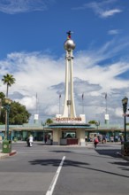 Replica of the Crossroads of the World tower and spinning globe at the entrance to Disney Hollywood