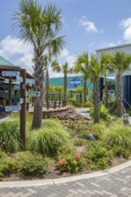 Sign directs guests to different attractions at Ocean Adventures Marine Park in Gulfport,