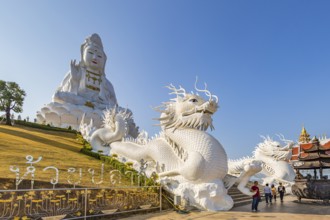 Chinese dragons line the steps up to the Guan Yin (Goddess of Mercy) statue at Wat Huay Pla Kang