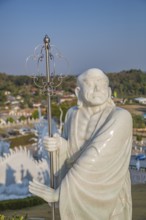 Statues around the perimeter of the Guan Yin (Goddess of Mercy) statue at Wat Huay Pla Kang Temple