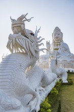 Chinese dragons line the steps up to the Guan Yin (Goddess of Mercy) statue at Wat Huay Pla Kang