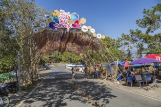 Colorful arched entrance to the Doi Tung tourist attraction in Chiang Rai, Thailand