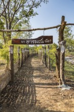 Walkway at the Akha Cottage coffee shop and restaurant in Chiang Rai Thiland asks What is your mood
