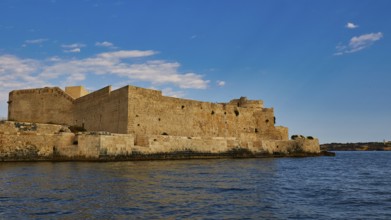 Castello Maniace, Maniace sea fortress, massive stone fortress on the water, characterised by