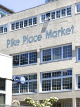 House wall with painted blue letters at Pike Place Market, Seattle, Washington, USA, North America