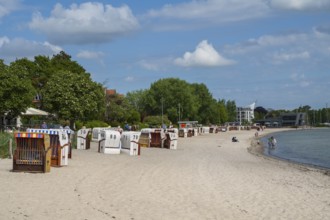 Beach chairs on the sandy beach, Ostsee Info Centre, Kurstrand, Nixe by E. Kowalke, Eckernförde,