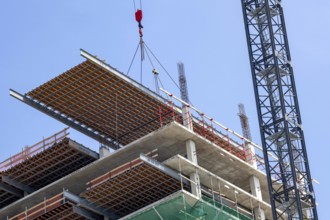 Detroit, Michigan - Construction of the 25-story JW Marriott Detroit Water Square hotel. The