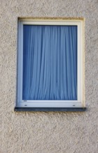 House facade, window with blue curtain, Steyr, Upper Austria, Austria