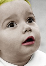 Little boy amazed, 1930s, close-up of a child with red coloured lips and astonished expression,