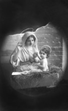 Mary and Jesus with halo, 1930s, Religious depiction of a woman with a halo holding a child, as in