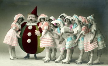 Ice ballet, 1920s, dancers in colourful vintage costumes dancing around a clown, historical photo