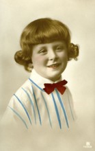 Portrait of a girl, 1920, girl in a striped shirt with a red bow, friendly and warm smile,