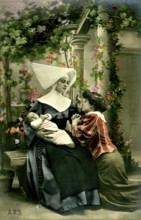 Nun, woman, baby, 1920, A nun holds a child, a woman kneels next to her in a flowering garden,