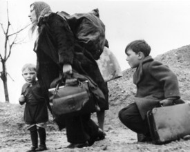 Mother and children with a lot of luggage, refugees displaced persons ca. 1946, A mother with two