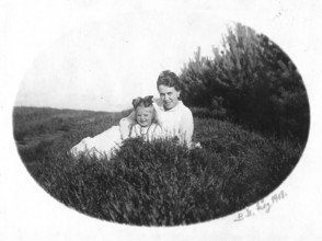 Mother and child, 1920s, Mother and daughter laughing in nature, Joy and relaxation, Black and