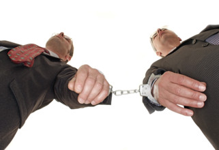 Businessman, two, handcuffs, suit and tie, Berlin, Germany, low angle shot of two men in handcuffs