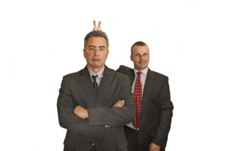 Businessman, two, suit and tie, Berlin, Germany, Two men in suits, the one in the back makes a