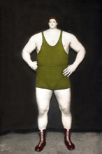 Strong man with a small head, Montage, c. 1930, Germany, A muscular man in a wrestling suit poses