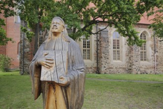 Monument from 1911 to hymn poet Paul Gerhardt and book with songbook and inscription to the hymn :