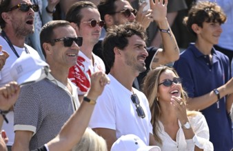 From left, actor Mark Keller, presenter Kai Pflaume, Mats Hummels with girlfriend Nicola Cavanis,