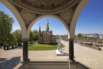 View from the pavilion to the Russian Chapel with the stainless steel sculpture by Tony Cragg,