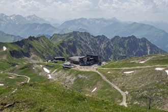 Edmund-Probst-Haus and Höfatsblick mountain station of the Nebelhornbahn, behind mountains of the