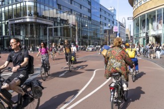 Central cycle path along the Vredenburg, in the city centre of Utrecht, lanes for pedestrians,