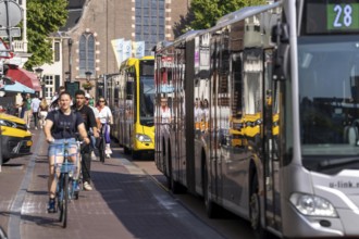 Central cycle path on the Lange Viestraat, lanes for pedestrians, cyclists and local traffic are
