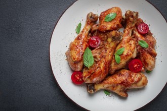 Fried chicken legs, in soy sauce, spices, herbs, top view, homemade