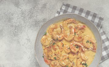 Shrimp in creamy garlic sauce, with spices and herbs